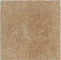 Forum Terra Umber travertine tile 4x4 tumbled, studio image showing rich warm brown tone with natural pores, softened edges, and subtle variation for rustic backsplashes, shower walls, and timeless accents.
