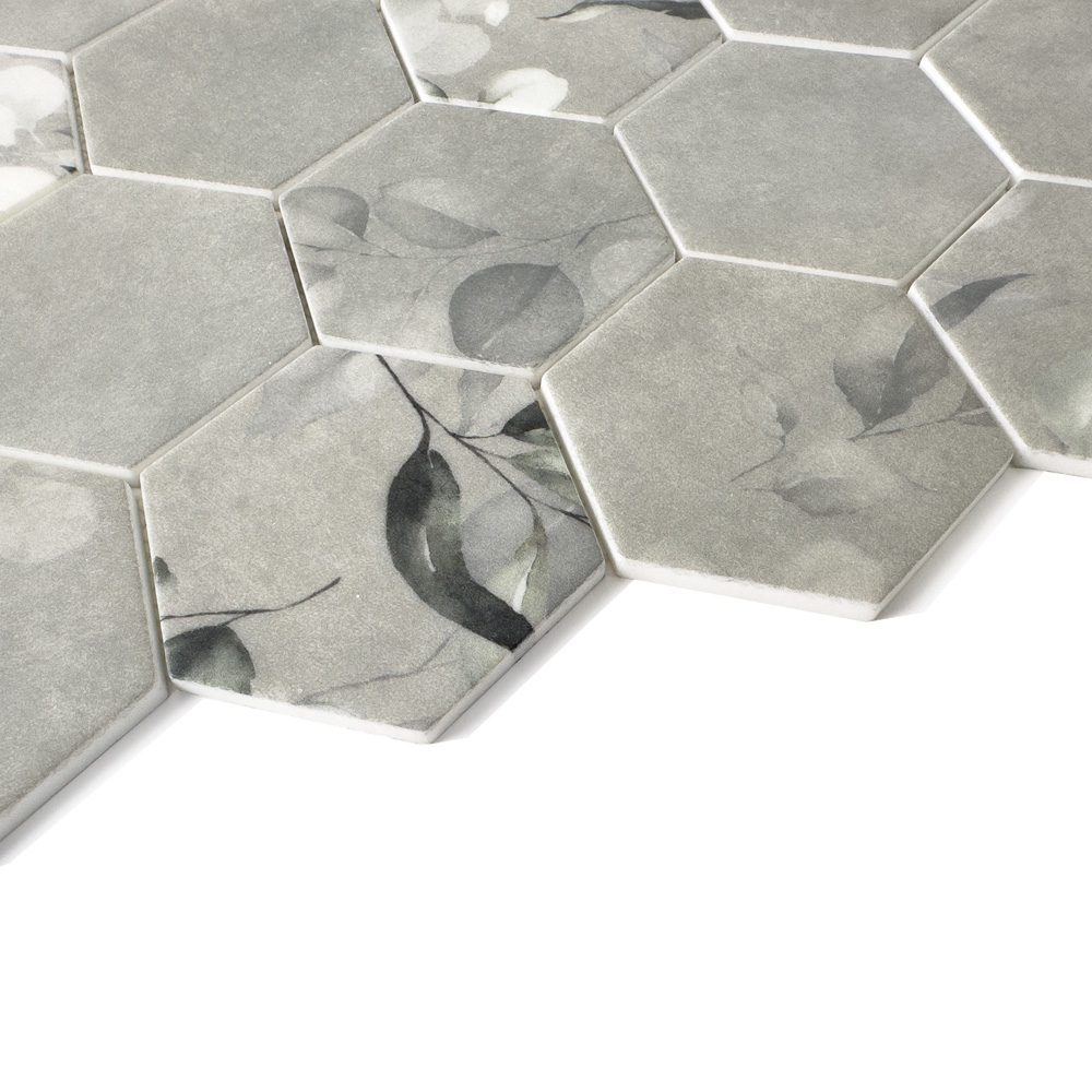 Close-up of HexaFusion Botanica Clover Petal matte pressed glass 3 inch hexagon mosaic with botanical pattern