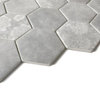 Close-up of HexaFusion Botanica Ivy Vale matte pressed glass 3 inch hexagon mosaic with floral pattern
