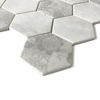 Close-up of HexaFusion Botanica Linden Bloom matte pressed glass 3 inch hexagon mosaic with floral pattern