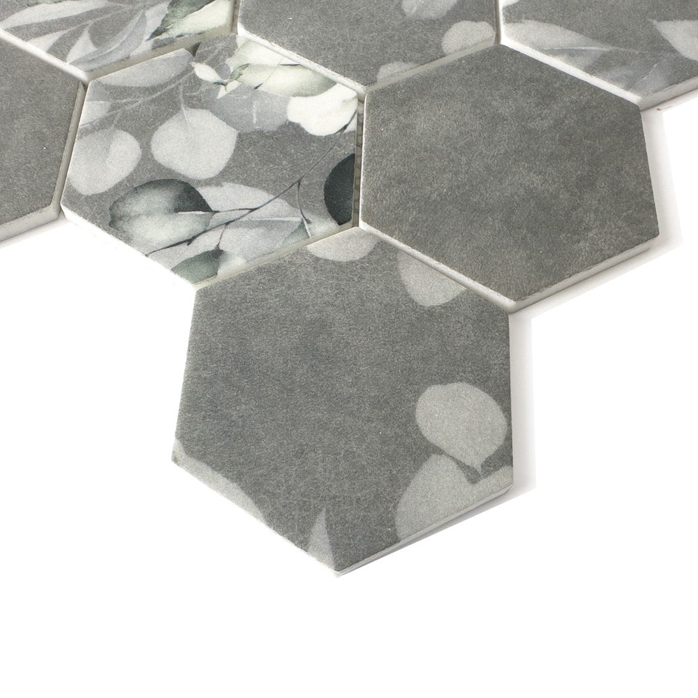 Close-up of HexaFusion Botanica Wisteria Sketch matte pressed glass 3 inch hexagon mosaic with botanical pattern