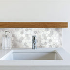 HexaFusion Mineral Alpine White matte pressed glass 1.5 inch hexagon mosaic installed as backsplash