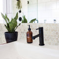 HexaFusion Mineral Vein Ivory matte pressed glass 1.5 inch hexagon mosaic installed as backsplash