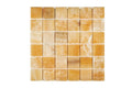 Opalus Honey onyx mosaic 2x2 polished, studio image showing warm honey-gold tones, natural translucency, and layered onyx movement across the mounted sheet.