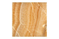 Opalus Honey onyx tile 18x18 polished, studio image showing warm honey-gold bands, natural translucency, and layered onyx movement with unique veining variation.