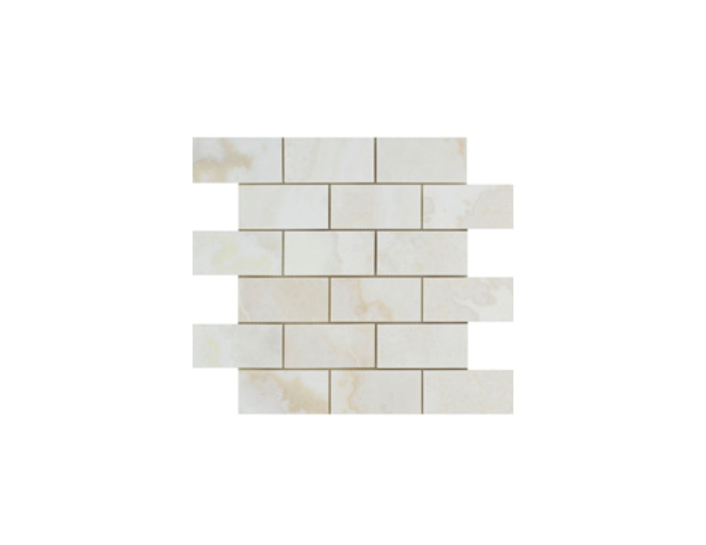 Opalus Vanilla onyx mosaic 2x4 cross-cut, studio image showing creamy ivory tones with soft cloud-like movement and natural translucency variation across the sheet.