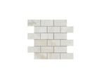 Opalus Vanilla onyx mosaic 2x4 cross-cut, studio image showing creamy ivory tones with soft cloud-like movement and natural translucency variation across the sheet.