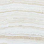 Opalus Vanilla onyx tile 12x12 vein-cut, studio image showing creamy ivory tones with soft, cloud-like banding and natural translucency variation.