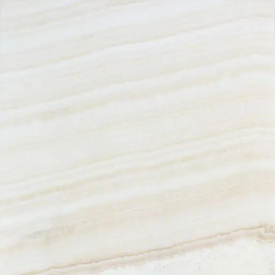 Opalus Vanilla onyx tile 12x12 vein-cut, studio image showing creamy ivory tones with linear banding, soft translucency, and natural veining variation.