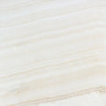 Opalus Vanilla onyx tile 12x12 vein-cut, studio image showing creamy ivory tones with linear banding, soft translucency, and natural veining variation.