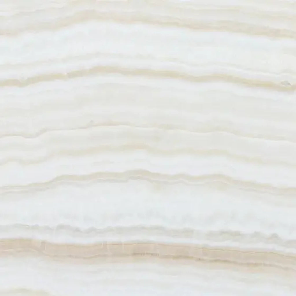 Opalus Vanilla onyx tile 18x18 vein-cut, studio image showing linear ivory banding, layered translucent depth, and natural veining variation from piece to piece.