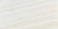 Opalus Vanilla onyx tile 3x6 cross-cut, studio image showing creamy ivory tones with soft cloud-like movement, natural translucency, and gentle tonal variation.