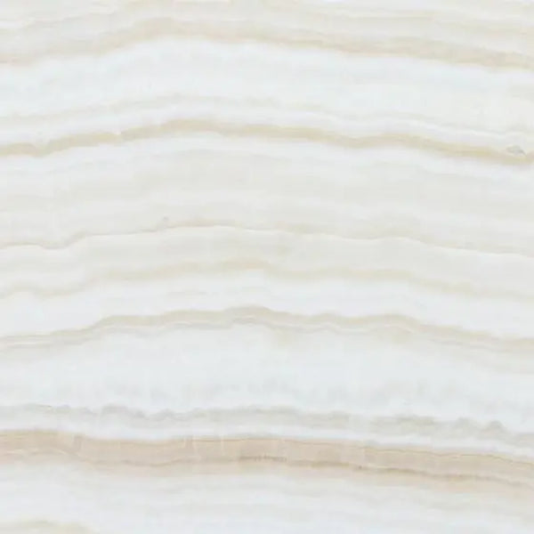 Opalus Vanilla onyx tile 4x4 vein-cut, studio image showing linear ivory banding, layered translucent depth, and natural veining variation.