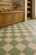Installed sage and sand checkerboard porcelain tile floor in a commercial interior, 7x7 matte