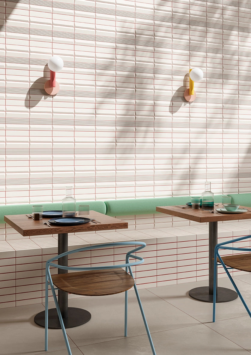 Porcelain Cream Tempo tile wall installation in a hospitality seating area.