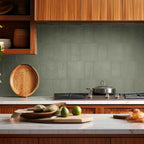 Oasis Sage troweled plaster-look porcelain tile installed as kitchen backsplash, 3.5 x 7 inch & 7 x 7 inch