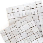 ArtePierre Zellige Atelier Lattice mosaic sheets in Cream, glossy handmade zellige terracotta highlighting glaze variation and subtle edge irregularity for backsplashes and shower walls.