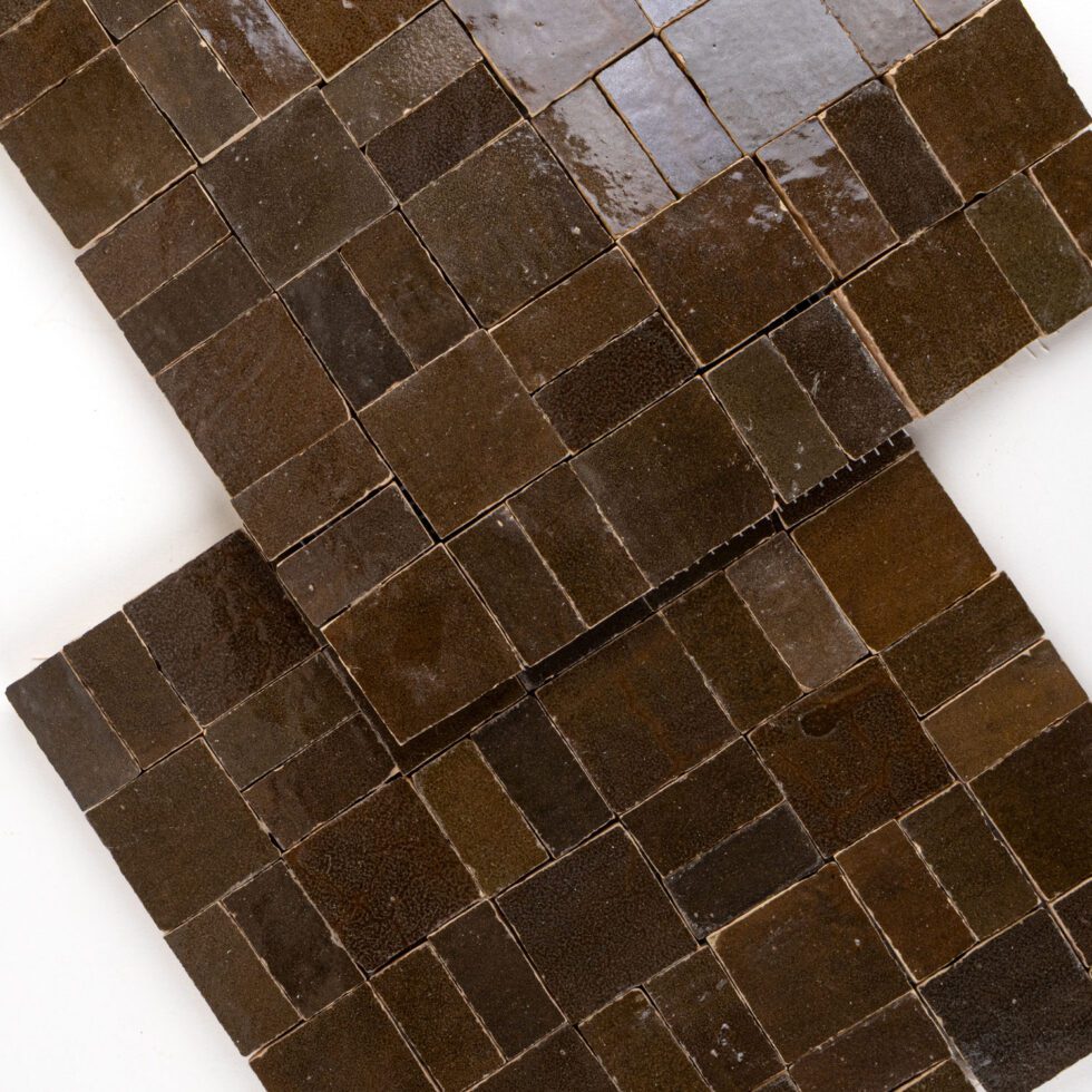 ArtePierre Zellige Atelier Lattice mosaic sheets in Espresso Noire (Brown), glossy handmade zellige terracotta highlighting surface depth, glaze variation, and hand-cut edges for backsplashes and shower walls.