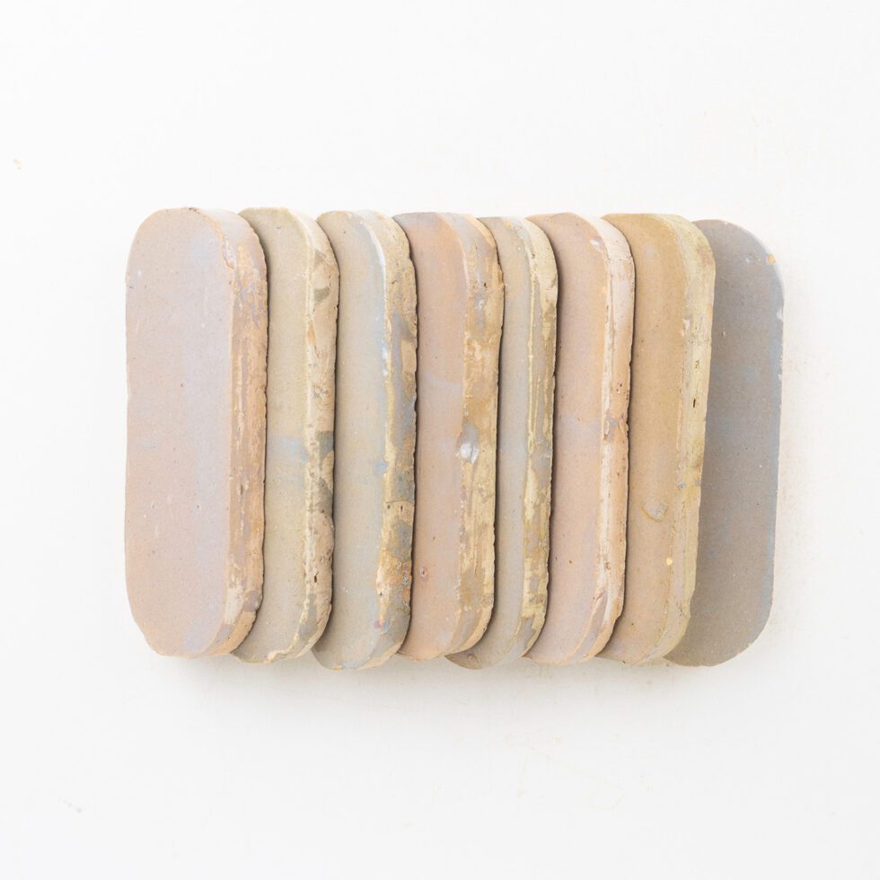 Mauve Riad zellige long oval tile 2x6 glossy - stacked side view