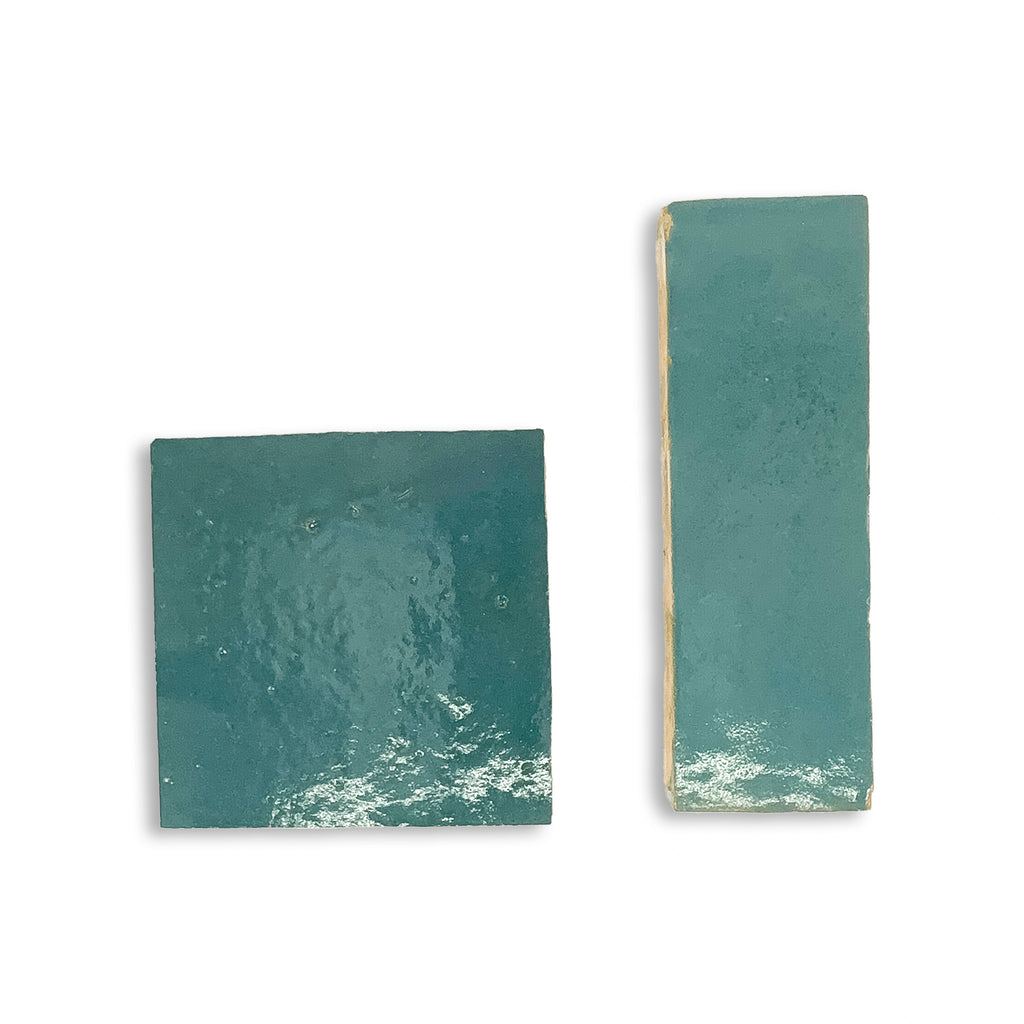 Close-up of Blue Medina glossy zellige showing glaze movement, tonal shifts, and handmade texture.