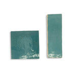 Close-up of Blue Medina glossy zellige showing glaze movement, tonal shifts, and handmade texture.