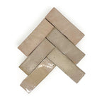 Desert Blush zellige tile 2x6 herringbone layout, glossy handmade blush wall tile