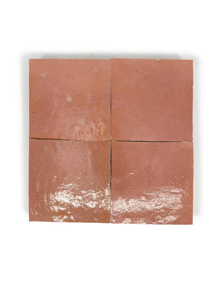 Ember Clay glossy zellige tile 4x4 layout sample, warm earthy terracotta tone with handmade variation.