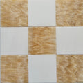 Checkered pattern of honey onyx and Bianco Dolomite tiles