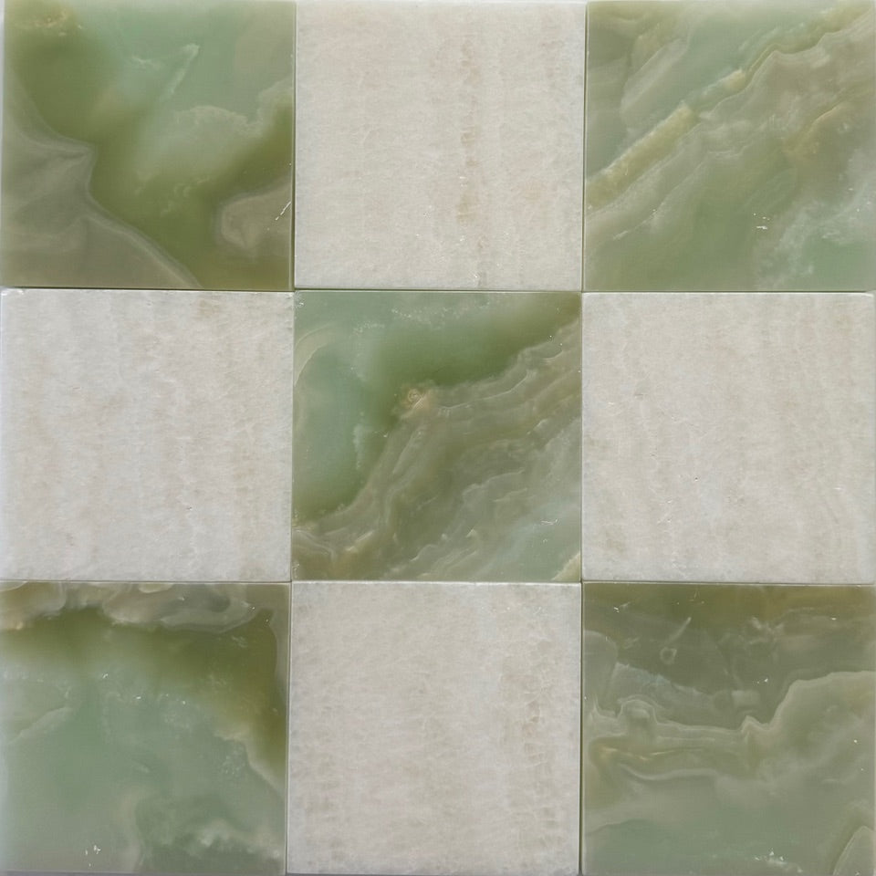 Checkerboard pattern of green and beige tiles