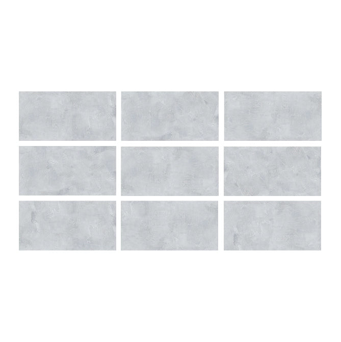 SeraPool RELAX Cemento Grey porcelain pool tile color sample showing 9 face variations with concrete-look texture.