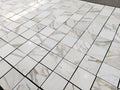 calacatta gold 12x12 marble tiles dry-lay for inspection and designer's final project approval 