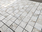 calacatta gold 12x12 marble tiles dry-lay for inspection and designer's final project approval 