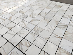 calacatta gold 12x12 marble tiles dry-lay for inspection and designer's final project approval 