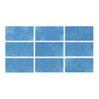 SeraPool RELAX porcelain pool tile sample board showing 9 face variations in blue, arranged in a 3×3 grid.